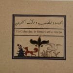 la-colombe-le-renard-et-le-heron-titre Illustration du Renard rusé menaçant la Colombe dans son nid sur le palmier.
